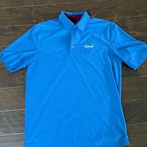 Mens Greg Norman golf polo. Size medium. Color blue. Great condition